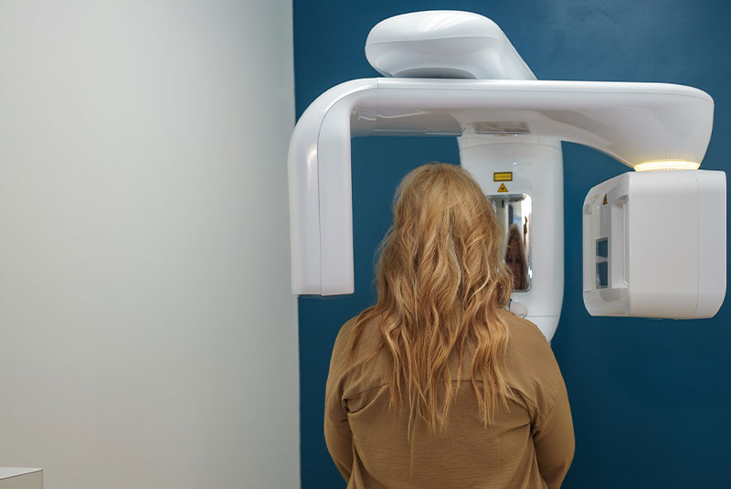 Patient taking a dental x-ray